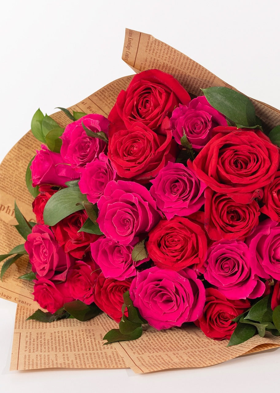 Ramo de 24 rosas rojas y fucsia