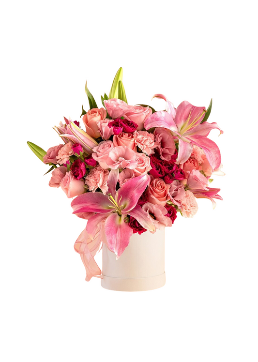 Caja con rosas y stargazers