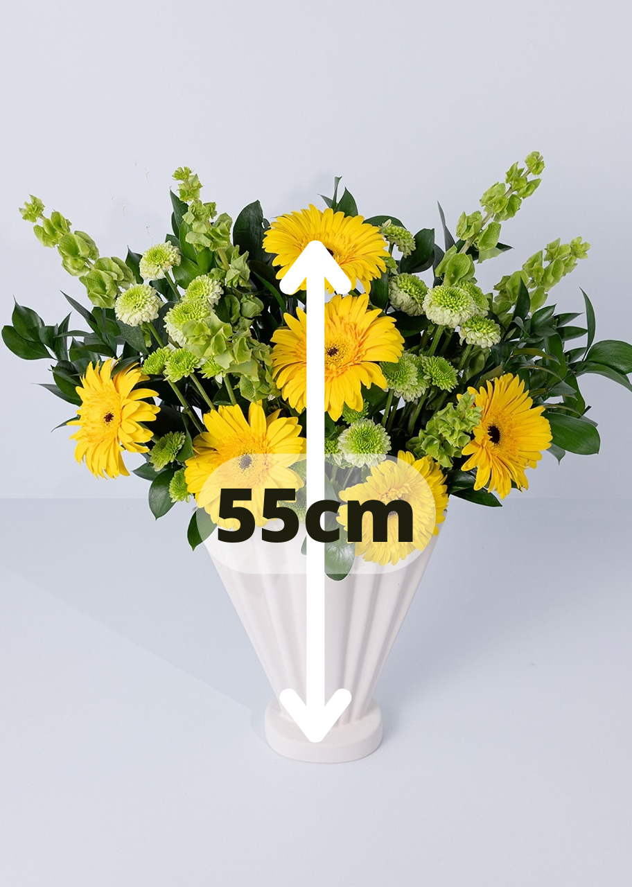 6 gerberas amarillas en jarrón