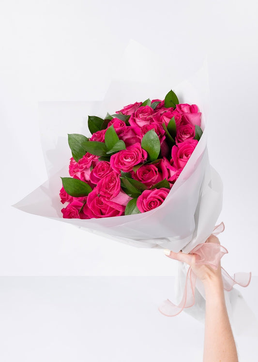 Ramo de 24 rosas fucsia