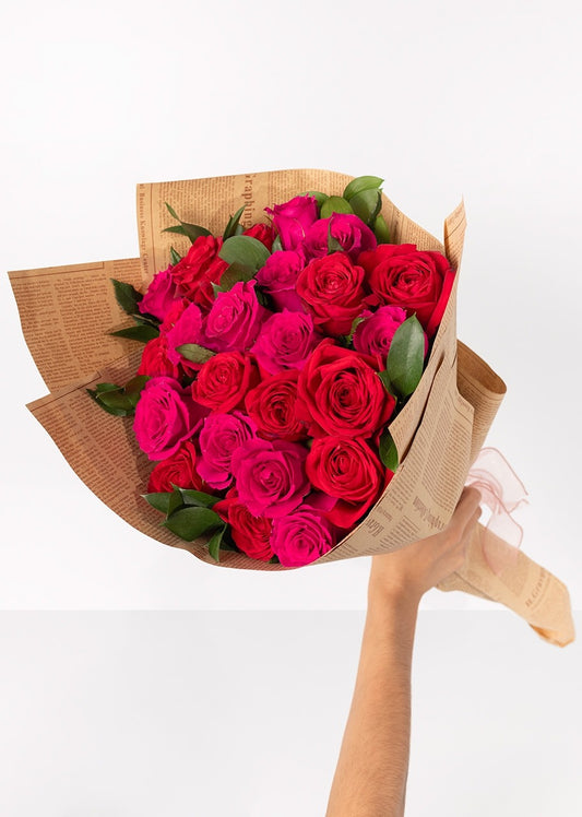 Ramo de 24 rosas rojas y fucsia
